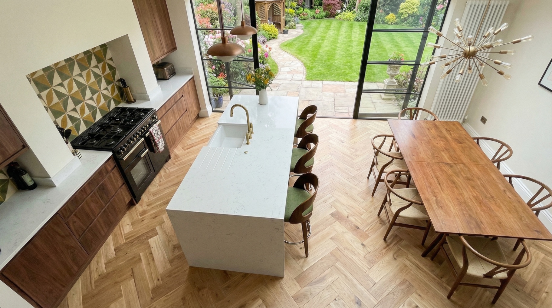 Medici Cremello Oak Herringbone — Straight on, island and patio beyond