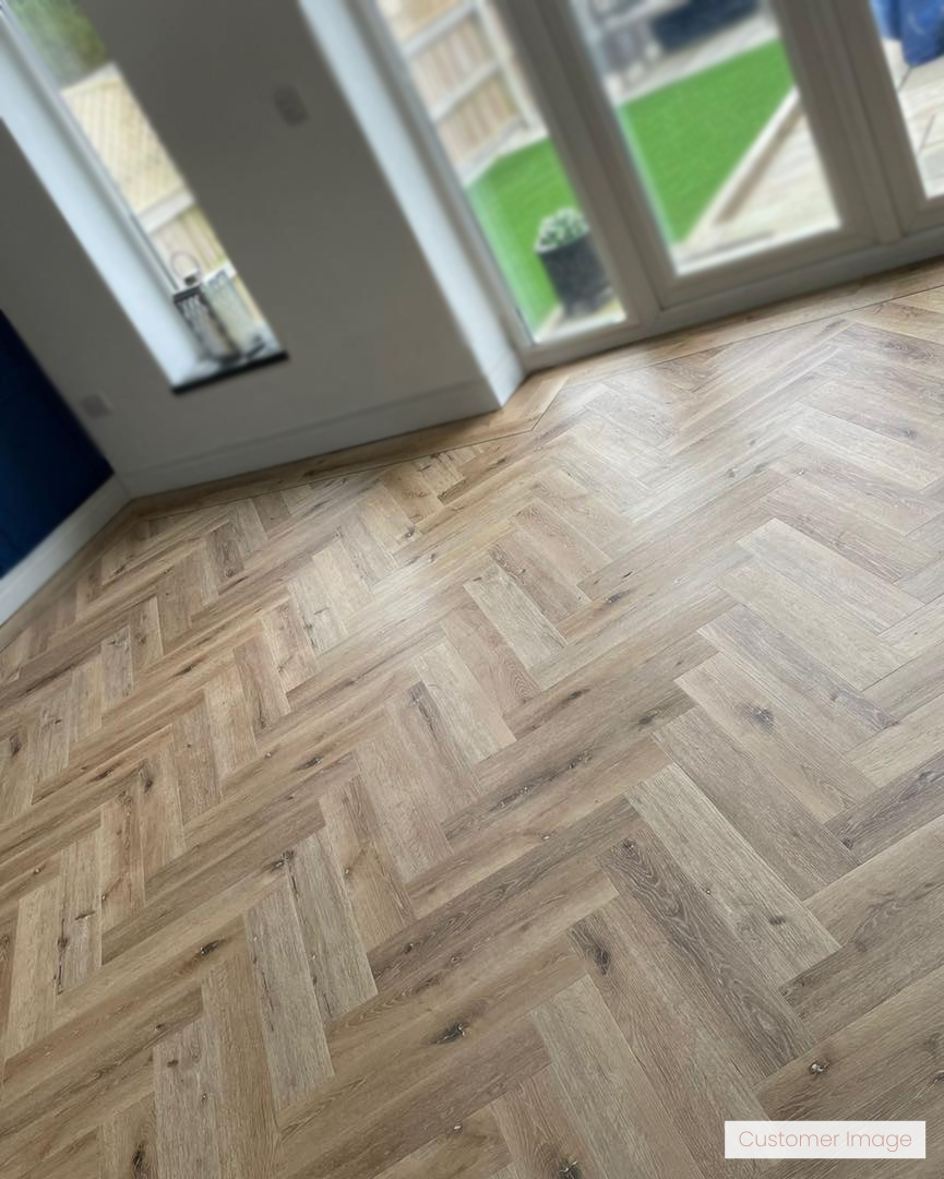 Lattia Vantaa Sunlit Birch Herringbone Glue Down LVT Flooring - Flooring Monster