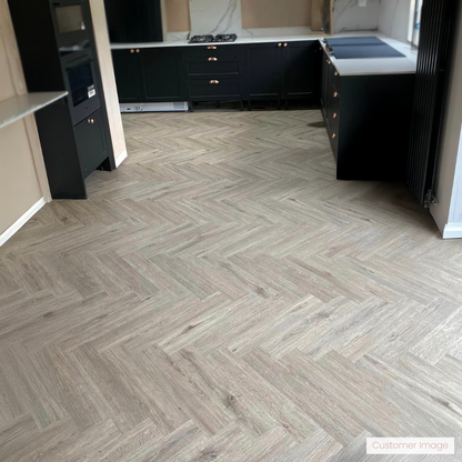 Lattia Vantaa Plaza Oak Herringbone Glue Down LVT Flooring - Flooring Monster